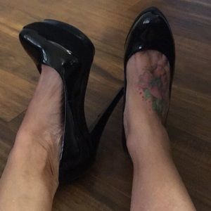 Black pattern leather Aldo platforms